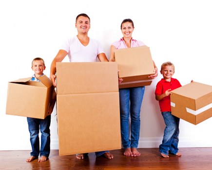 Movers assisting a Waterloo home move with boxes and furniture