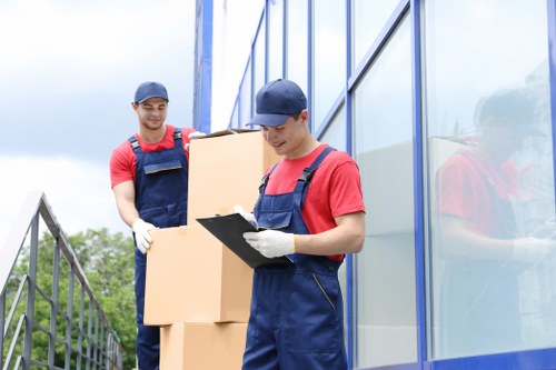 Moving van and packed boxes for a Waterloo home removal