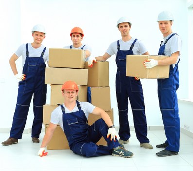 Man and van removals service in Waterloo with moving van and boxes