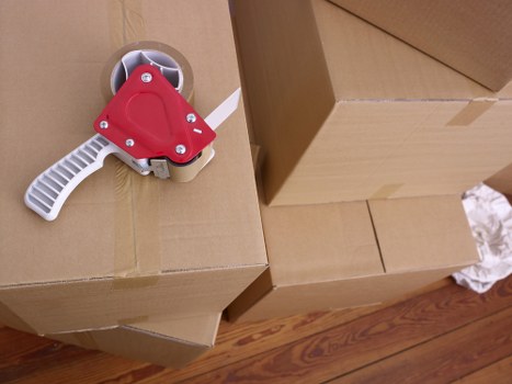 Packed boxes and furniture ready for transport during a Waterloo house move