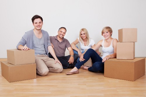 Local movers packing boxes in a Waterloo home or apartment